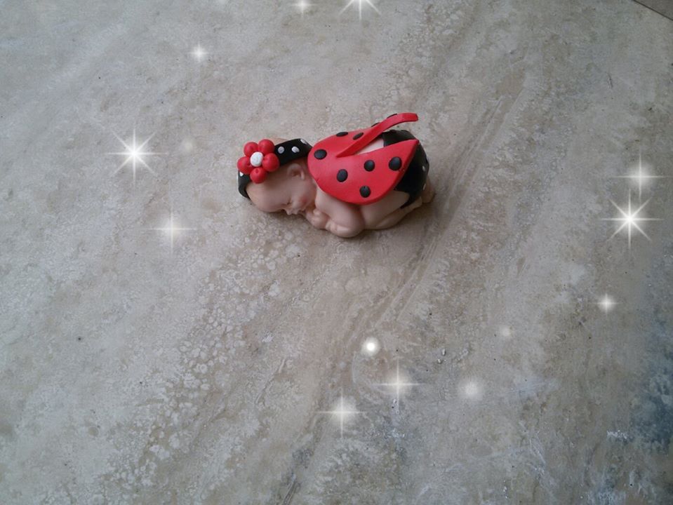 bimba in fimo coccinella