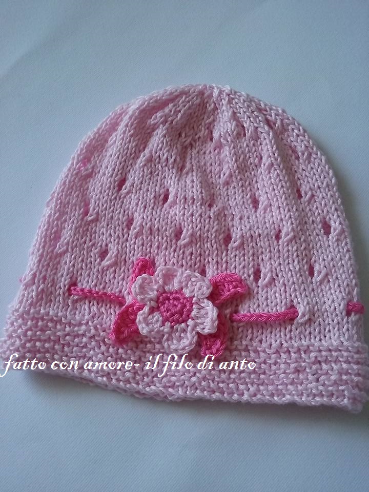 Cappello bambina rosa con fiore e foglioline